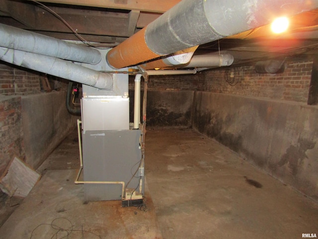 906 E Broadway St, Astoria, IL 61501 - unfinished basement with heating unit