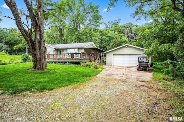 21016 N US Highway 24, Canton, IL 61520 - ranch-style house featuring an outdoor structure, a garage, a deck, and a front yard
