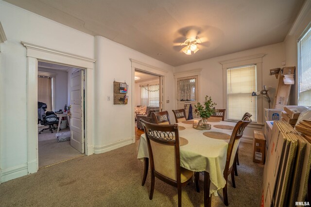 1624 W Barker Ave, Peoria, IL 61606 - carpeted dining room with baseboards and a ceiling fan