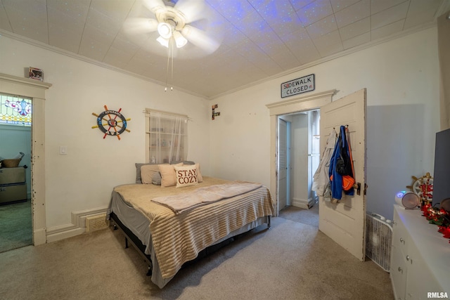 1624 W Barker Ave, Peoria, IL 61606 - carpeted bedroom featuring ornamental molding and a ceiling fan