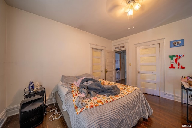 1624 W Barker Ave, Peoria, IL 61606 - bedroom featuring baseboards, wood finished floors, and a ceiling fan