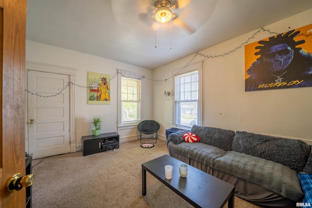 1624 W Barker Ave, Peoria, IL 61606 - carpeted living area with a ceiling fan and baseboards