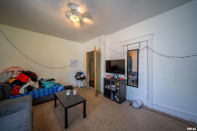 1624 W Barker Ave, Peoria, IL 61606 - living area with a ceiling fan and carpet flooring