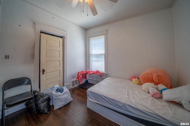 1624 W Barker Ave, Peoria, IL 61606 - bedroom with dark wood-type flooring, ornamental molding, and ceiling fan