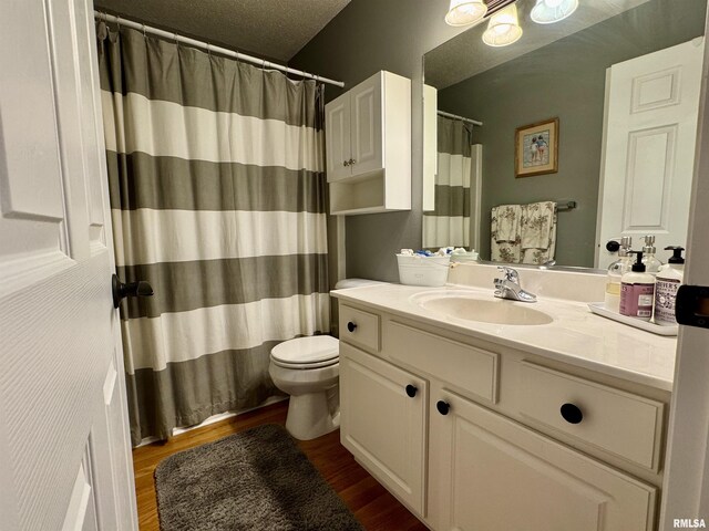 full bath with wood finished floors, vanity, toilet, and a shower with shower curtain