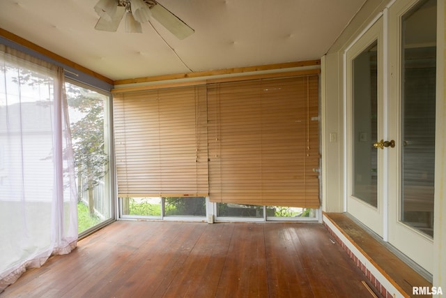 606 W Maywood Ave, Peoria, IL 61604 - unfurnished sunroom with a ceiling fan, hardwood / wood-style floors, and plenty of natural light