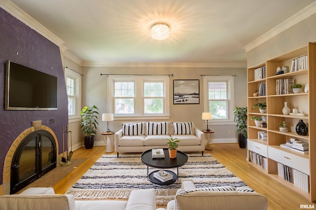 606 W Maywood Ave, Peoria, IL 61604 - living area featuring light wood-style flooring and crown molding