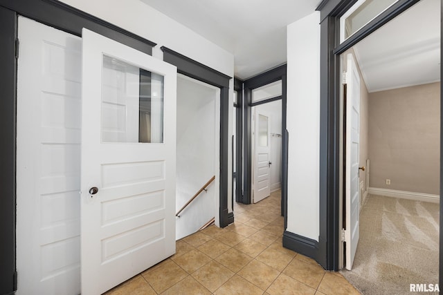 1803 W Barker Ave, Peoria, IL 61606 - corridor with an upstairs landing, light tile patterned floors, and baseboards