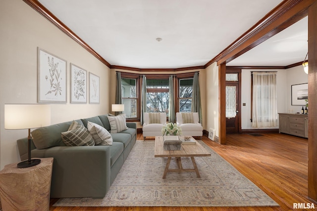 1803 W Barker Ave, Peoria, IL 61606 - living area with ornamental molding, wood finished floors, and baseboards
