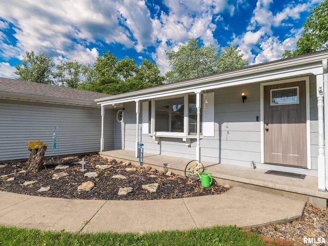106 N 5th St, Dunlap, IL 61525 - view of exterior entry with covered porch
