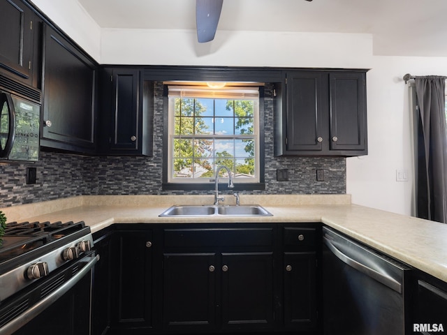 106 N 5th St, Dunlap, IL 61525 - kitchen with stainless steel appliances, dark cabinets, backsplash, and light countertops