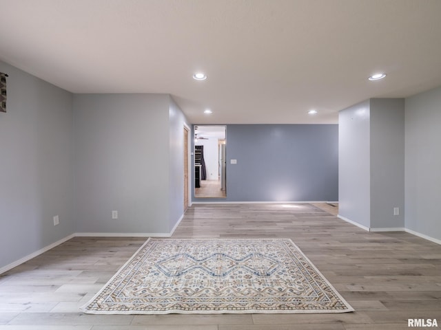 106 N 5th St, Dunlap, IL 61525 - empty room with light wood finished floors and recessed lighting