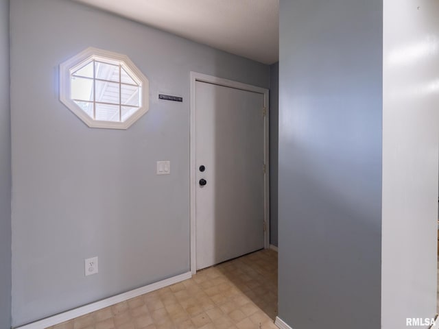 106 N 5th St, Dunlap, IL 61525 - foyer featuring light flooring and baseboards