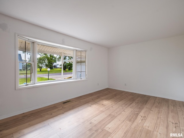 106 N 5th St, Dunlap, IL 61525 - empty room featuring light wood-style floors