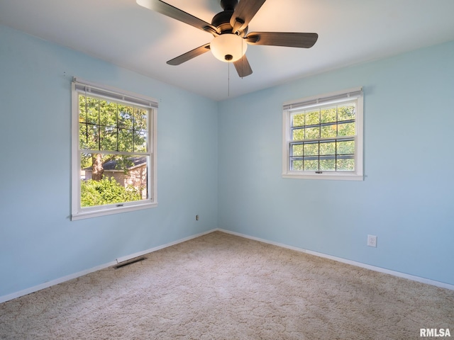 106 N 5th St, Dunlap, IL 61525 - empty room with carpet flooring and a ceiling fan