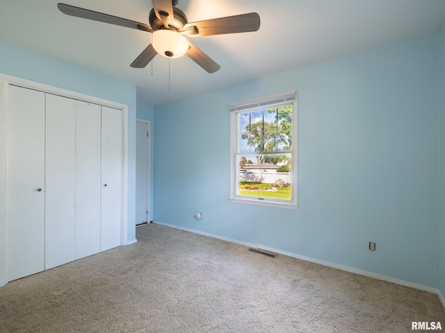 106 N 5th St, Dunlap, IL 61525 - unfurnished bedroom featuring carpet flooring, a closet, and a ceiling fan