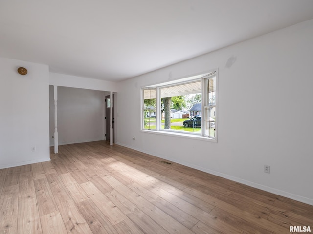 106 N 5th St, Dunlap, IL 61525 - unfurnished room with light wood-style flooring