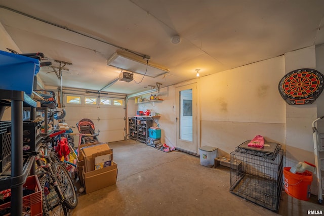garage featuring a garage door opener