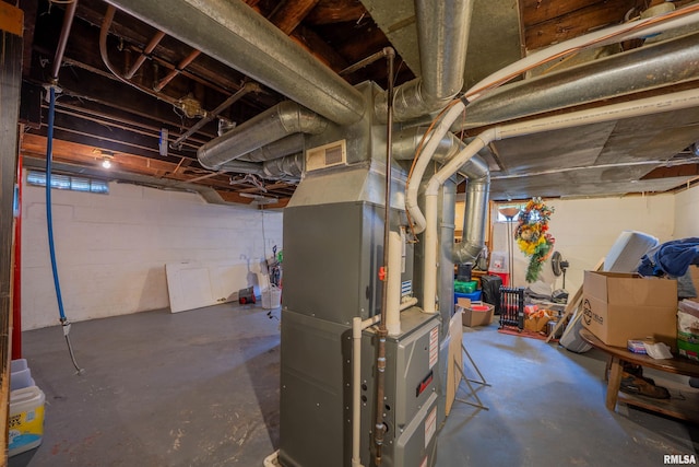 unfinished basement with heating unit