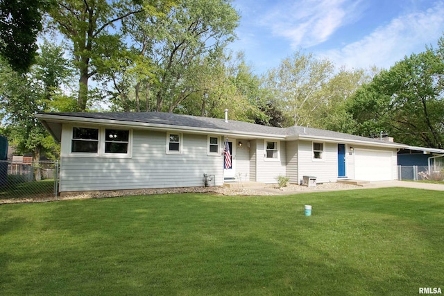 ranch-style home featuring an attached garage and concrete driveway