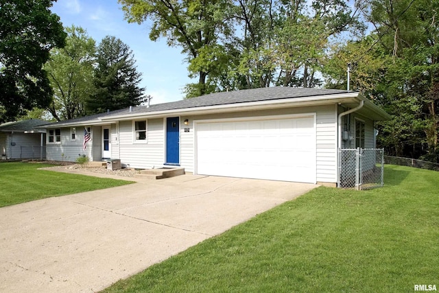 ranch-style home featuring an attached garage