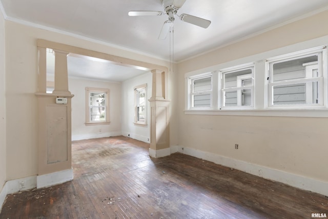 910 W Virginia Ave, Peoria, IL 61604 - entrance foyer featuring hardwood / wood-style flooring, crown molding, ornate columns, baseboards, and a ceiling fan