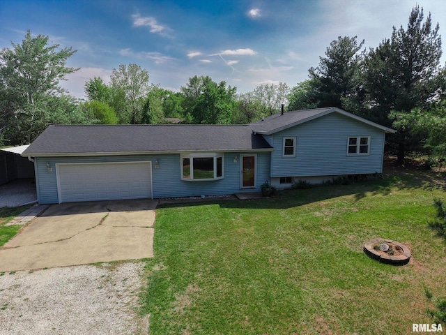 split level home with concrete driveway, a garage, and a front yard