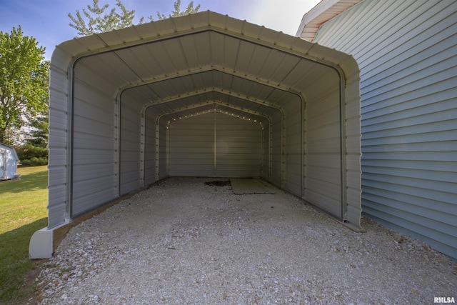 view of parking / parking lot with a detached carport