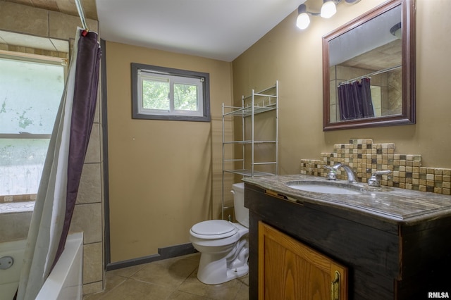 bathroom with toilet, tile patterned flooring, vanity, shower / tub combo with curtain, and backsplash