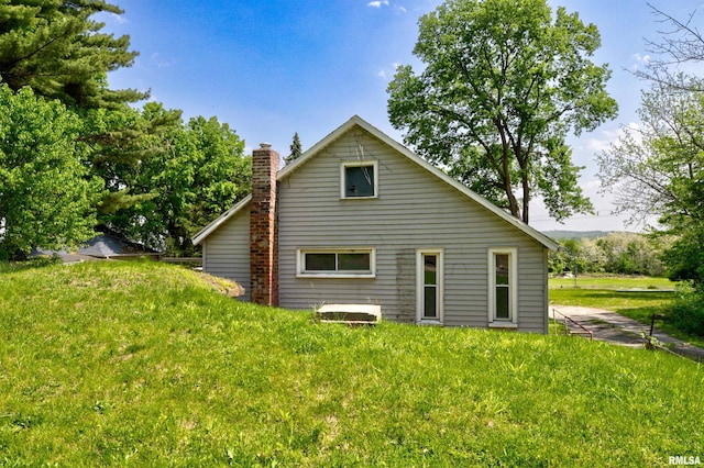rear view of house with a chimney