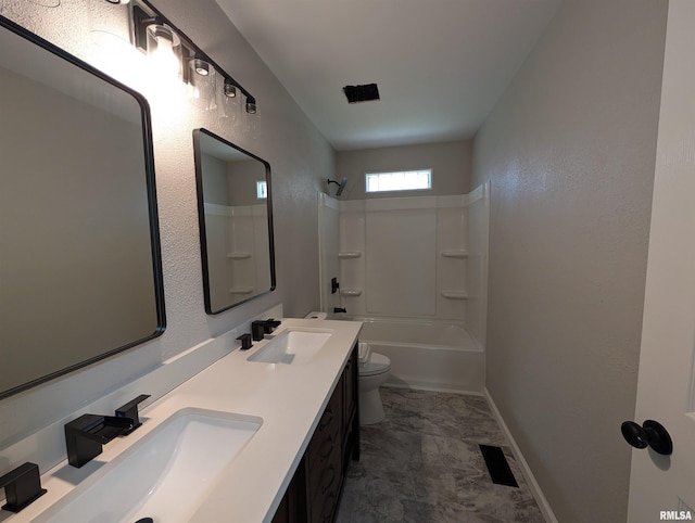 bathroom with toilet, baseboards,  shower combination, double vanity, and marble look tiles
