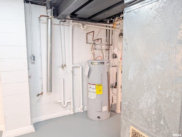 utility room featuring electric water heater