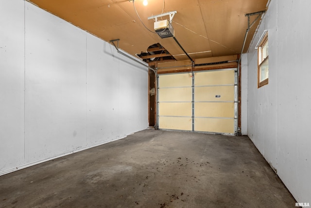 garage featuring a garage door opener