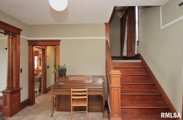 102 2nd St, Camp Grove, IL 61424 - staircase featuring tile patterned floors and baseboards