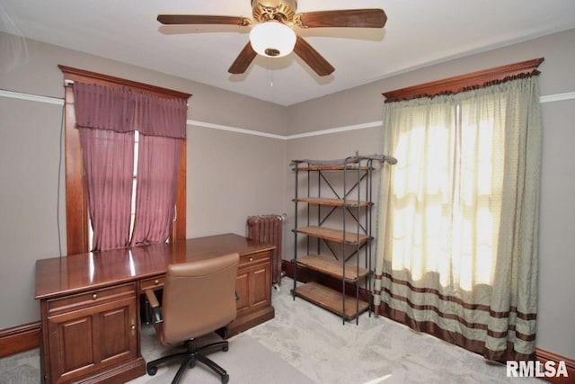 102 2nd St, Camp Grove, IL 61424 - home office with radiator, light colored carpet, and ceiling fan