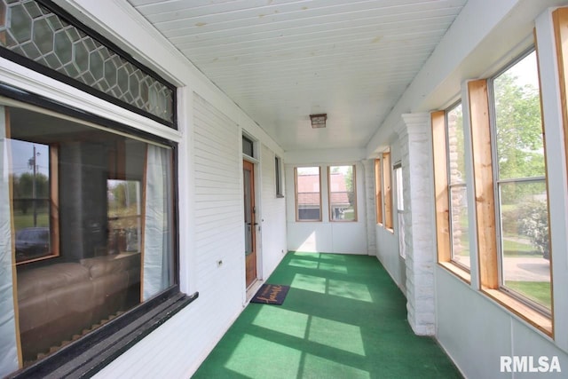102 2nd St, Camp Grove, IL 61424 - unfurnished sunroom featuring carpet flooring
