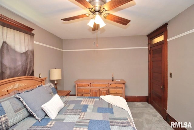 102 2nd St, Camp Grove, IL 61424 - bedroom with ceiling fan, carpet floors, and baseboards