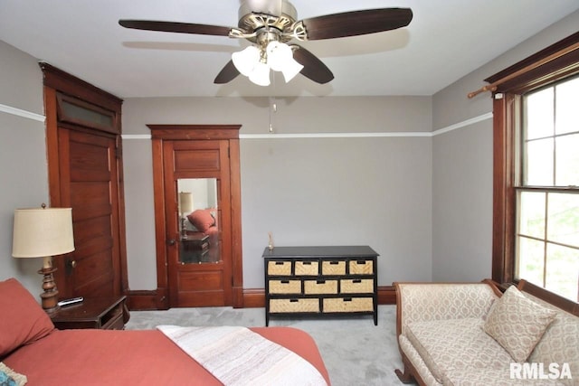 102 2nd St, Camp Grove, IL 61424 - bedroom with light colored carpet and ceiling fan
