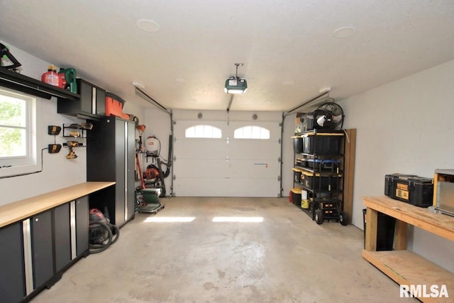 102 2nd St, Camp Grove, IL 61424 - garage featuring a garage door opener