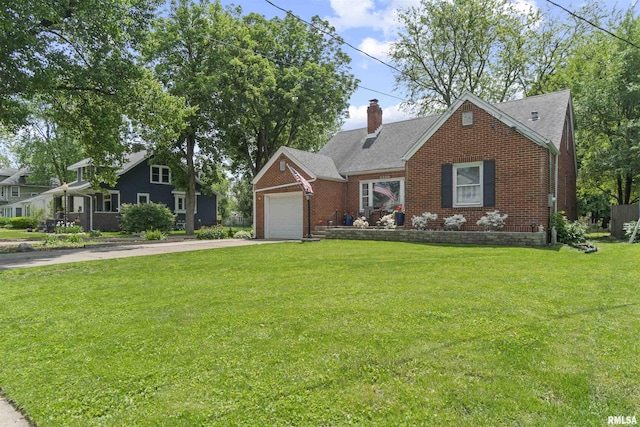 2220 W Ayres Ave, West Peoria, IL 61604 - view of front of property featuring brick siding, a front yard, a chimney, driveway, and a garage