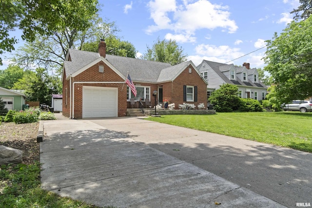 2220 W Ayres Ave, West Peoria, IL 61604 - view of front facade featuring brick siding, driveway, a front lawn, and an attached garage