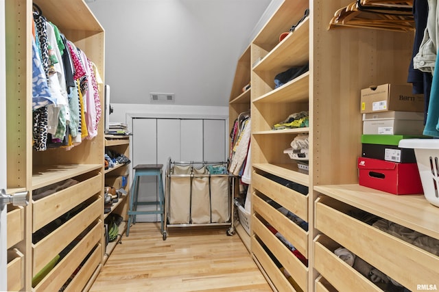 2220 W Ayres Ave, West Peoria, IL 61604 - walk in closet featuring light wood finished floors
