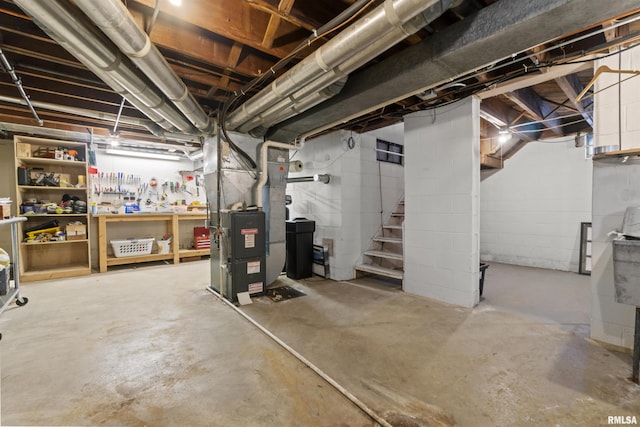 2220 W Ayres Ave, West Peoria, IL 61604 - unfinished basement featuring heating unit and stairway