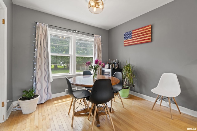 2220 W Ayres Ave, West Peoria, IL 61604 - dining space featuring baseboards and hardwood / wood-style floors