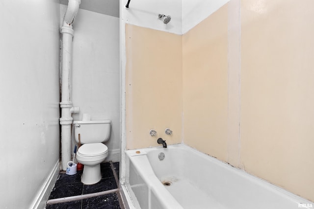 bathroom featuring toilet, tile patterned flooring, and baseboards