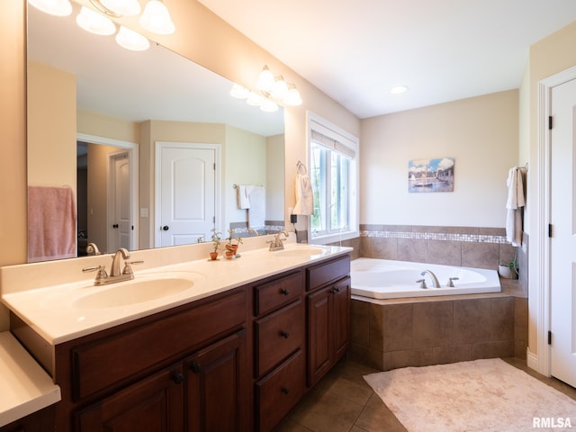 bathroom featuring tile patterned floors, a garden tub, and double vanity