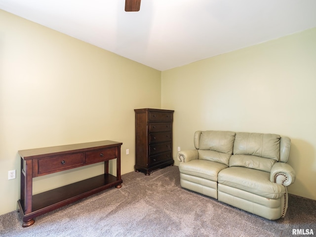 sitting room featuring carpet floors and ceiling fan