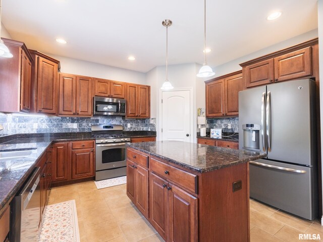 kitchen with stainless steel appliances, a center island, decorative backsplash, light tile patterned floors, and recessed lighting