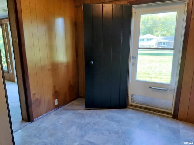 927 W Oakview Dr, Peoria, IL 61615 - doorway to outside with wood walls and healthy amount of natural light