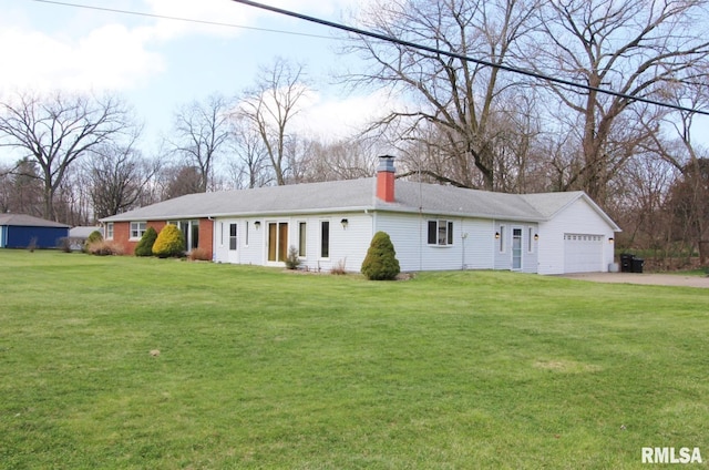 927 W Oakview Dr, Peoria, IL 61615 - ranch-style house featuring driveway, a garage, a chimney, and a front lawn